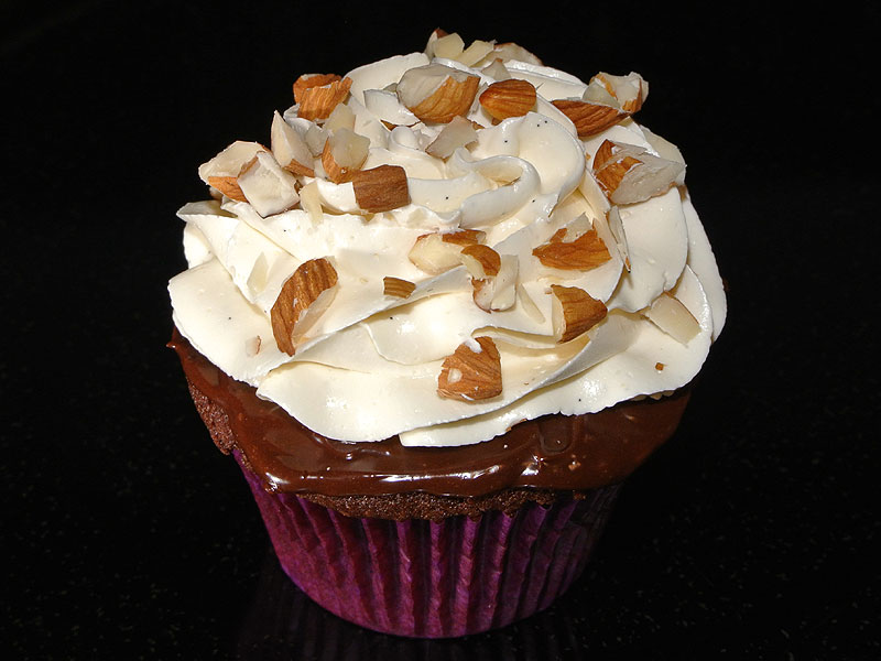 Chocolate with almond filling, ganache, and vanilla buttercream <i>(gf)</i><br>July 5